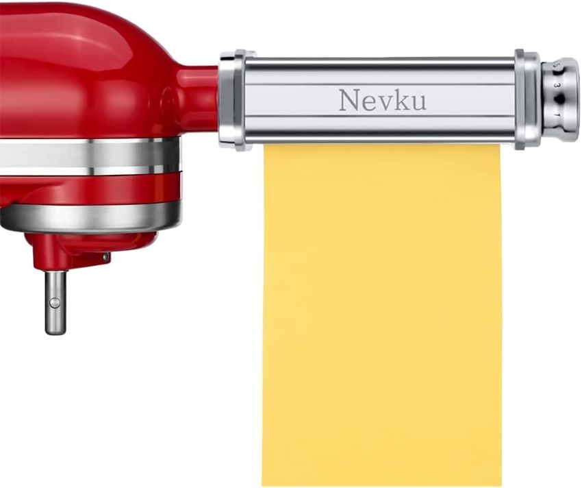 Fresh pasta sheets being rolled and cut using Nevku KitchenAid pasta maker attachments.